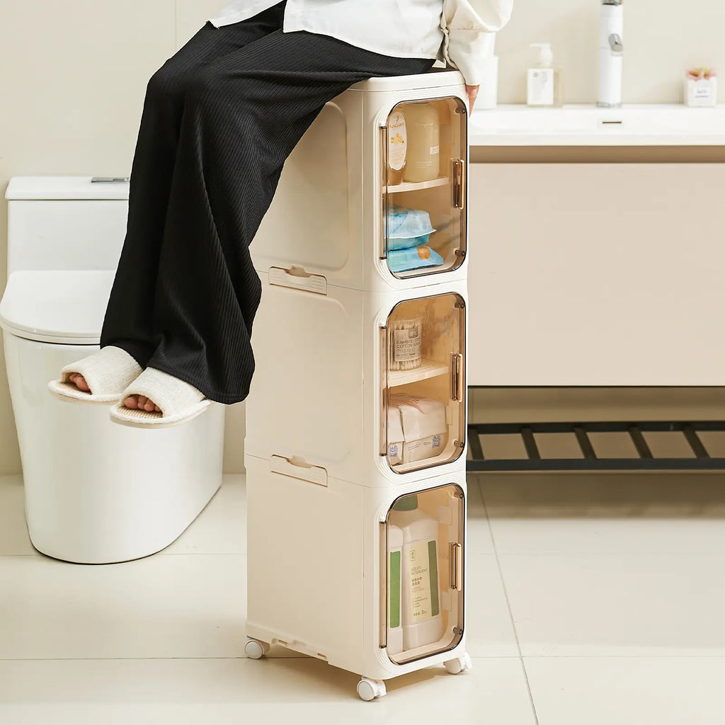 UFORU four-layer tall and narrow storage cabinet, made of plastic, with a slim design, doors and adjustable shelves, wheels, stackable and foldable, suitable for small spaces, bathrooms and kitchens.